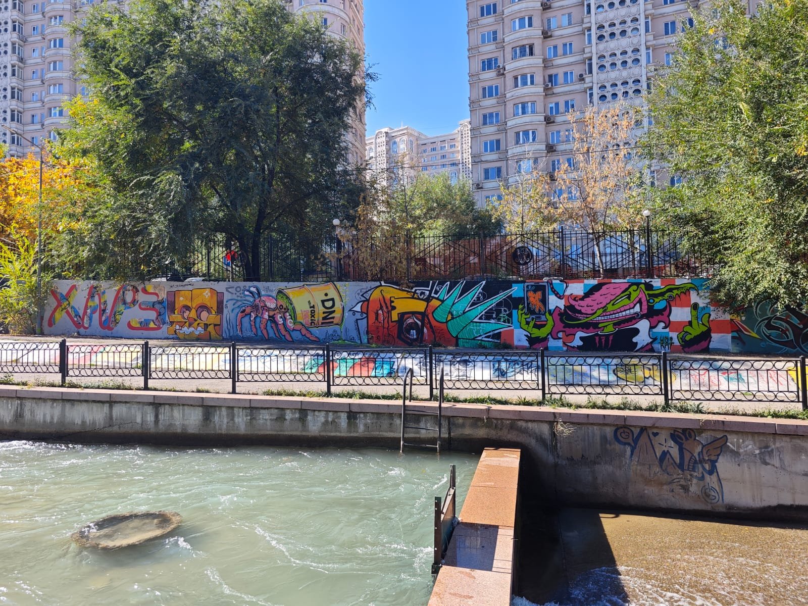 Graffiti Wall Almaty: Where Art Breathes Along the River