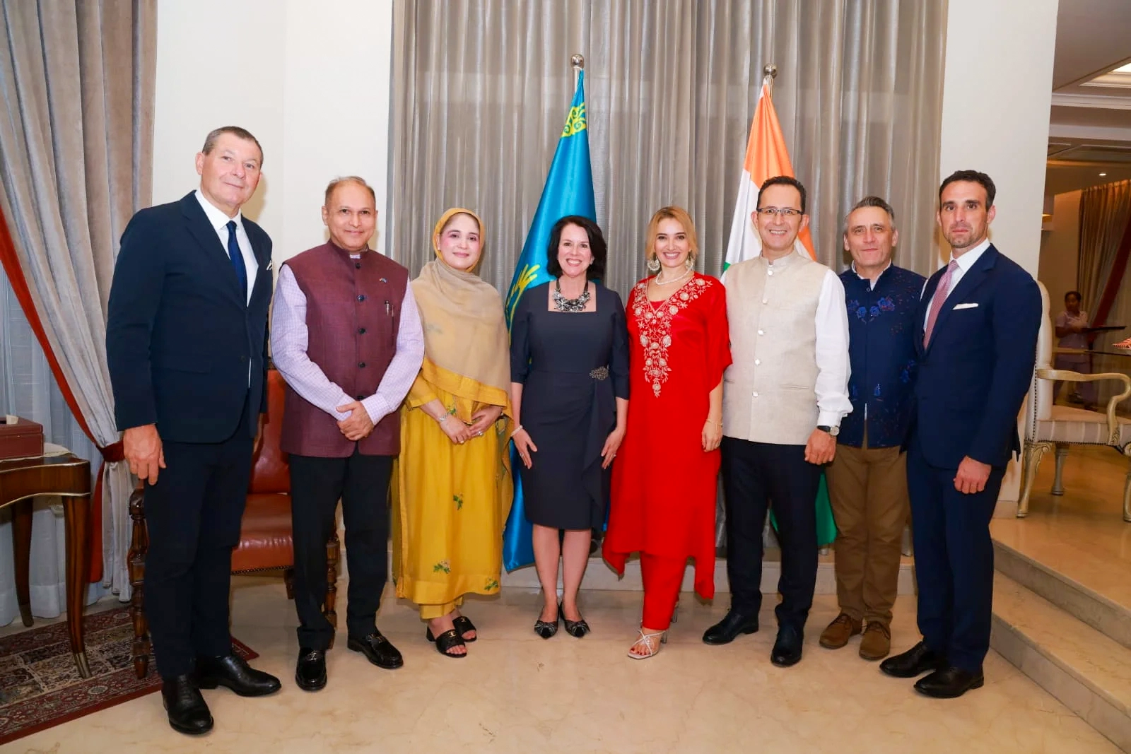 Dr. Nawab Mir Nasir Ali Khan and Begum Meher Fatima Khan with U.S. Consul General Laura Williams and fellow diplomatic guests at a dinner in Hyderabad.
