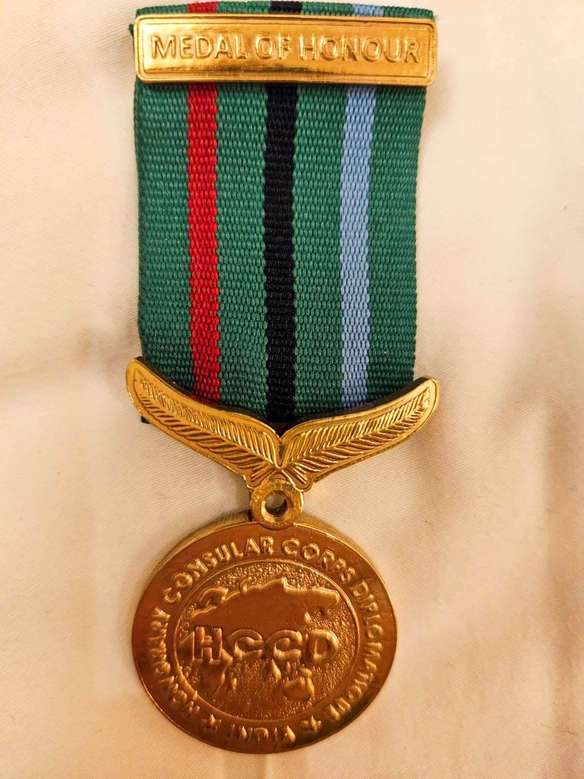 The Medal of Honour awarded by the Honorary Consular Corps Diplomatique India (HCCD).
